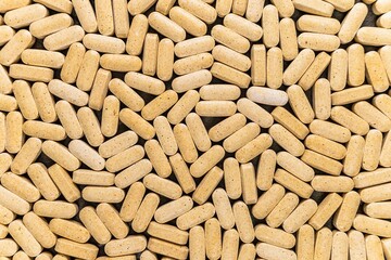 Tablets vitamins with a source of nutrients for vegetarians and lovers of healthy lifestyle