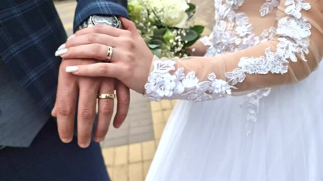 Newly Married Couple Holding Hands with Bouquet  Close up Video