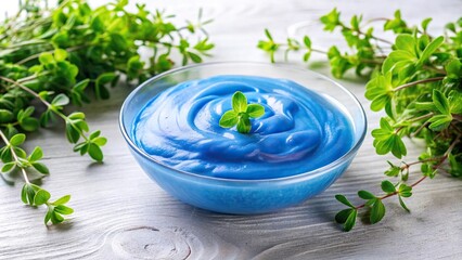 A bowl of periwinkle colored slime with a few greenery plants around it, minimalist decor, peaceful ambiance, plants, small decorative items, soothing colors