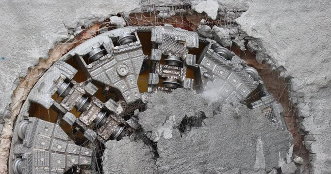 Tunnel boring machine(TBM) head on display at subway construction site ,underground infrastructure transportation