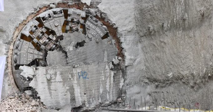 Tunnel boring machine(TBM) head on display at subway construction site ,underground infrastructure transportation