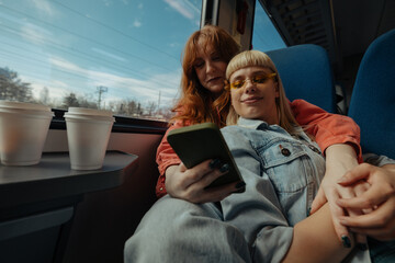 Women enjoying train travel together