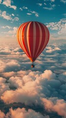 Fototapeta premium A red and white hot air balloon floats high amidst blue, yellow, and pink skies, creating a serene and idyllic sunrise setting.
