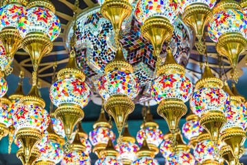 Colorful lamp with decorative patterned glass decoration in oriental style related to Arabic or Turkish culture