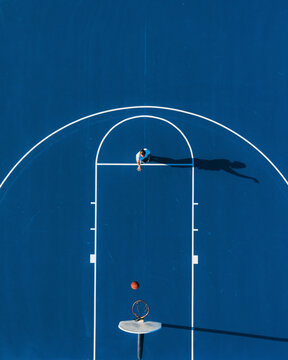 Aerial view of a beautiful basketball court with players and a ball, Arlington, Texas, United States.