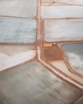 Aerial view of colorful geometric patterns in salt marshes, Useless Loop, Australia.