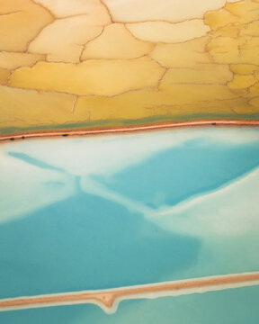 Aerial view of beautiful salt marshes with vivid patterns and turquoise water, Useless Loop, Shark Bay, Australia.