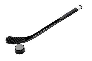 Black hockey stick and puck isolated on a transparent background, ideal for sports and equipment themes in stock photography.