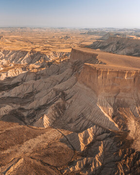 Aerial view of beautiful rock formations and arid desert landscape, Mirador de Juan Obispo, Bardenas Reales, Spain.