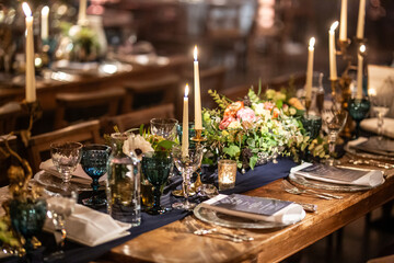 Candlelit Dinner Table with Floral Centerpiece