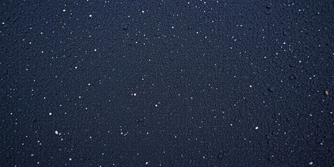 Fototapeta premium An up-close view of rough and gritty asphalt texture, material, surface, asphalt texture