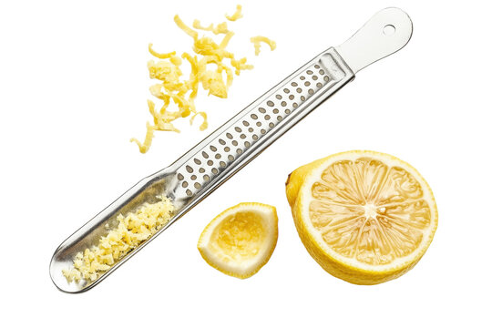 Fresh lemon zest and fruit preparation on a clean white surface for culinary creations