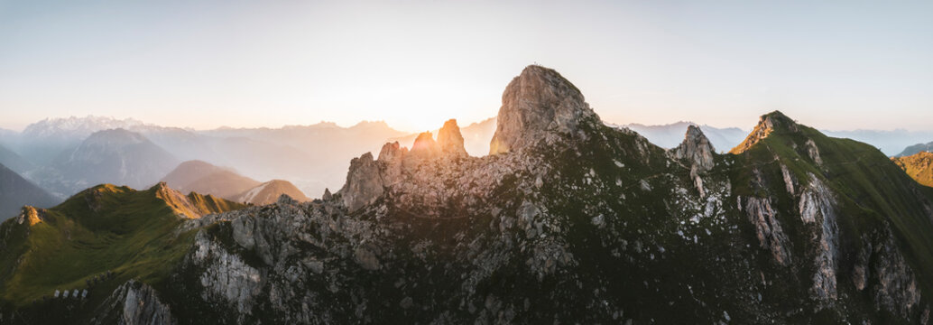 Aerial view of majestic Pierre Avoi summit surrounded by rugged mountains at sunset, Verbier, Switzerland.