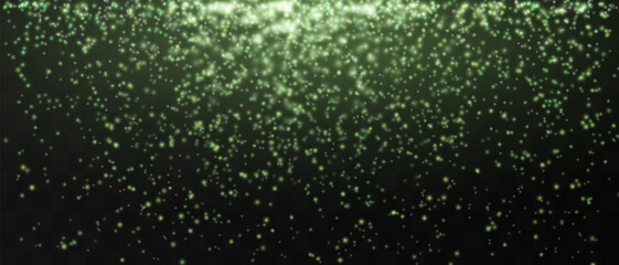 Bright green particles gently falling on a dark background, creating a magical and festive atmosphere. Glittering particles on a transparent background. Light with flares