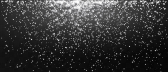 Bright white particles gently falling on a dark background, creating a magical and festive atmosphere. Glittering particles on a transparent background. Light with flares