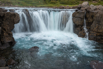 Wide foaming water waterfall 