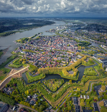 Aerial view of beautiful fort city with clear river and natural landscape, Gorinchem, Netherlands.