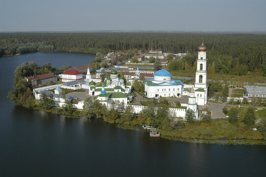 Aerial view of raifa monastery surrounded by serene lake and tranquil forest, Raifa, Russia.