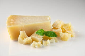 Authentic Italian Parmigiano Reggiano: Aged Cheese Wedge Isolated on White Background