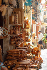 Craft items and souvenirs for sale in the old town of Kerkyra, Corfu, Greece, offering tourists unique handmade gifts and local treasures.