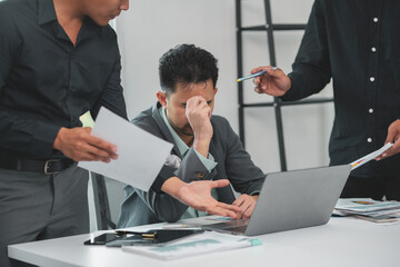 Business team discussing and arguing about bad project results in office, focusing on stressed...