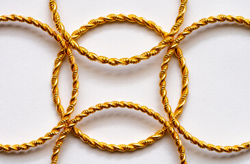 Macro shot of Turkish gold (Quarter or Full gold) on a white background