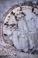 Tunnel boring machine(TBM) head on display at subway construction site ,underground infrastructure transportation