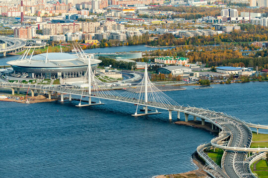 Aerial view of the little neva mouth river with a stunning cityscape featuring a bridge and stadium, Saint Petersburg, Russia.