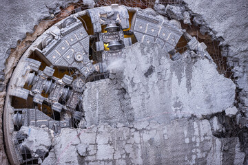 Tunnel boring machine(TBM) head on display at subway construction site ,underground infrastructure transportation