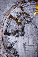 Tunnel boring machine(TBM) head on display at subway construction site ,underground infrastructure transportation