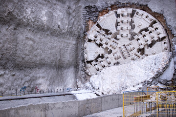 Tunnel boring machine(TBM) head on display at subway construction site ,underground infrastructure...