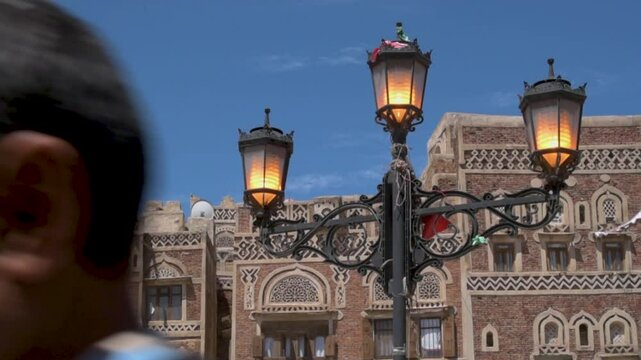 Lamp light in old Sana'a city-style lit during the day