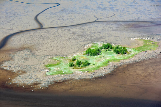 Aerial view of serene and tranquil Onega Bay with lush green islands and pristine water, Karelia Republic, Russia.