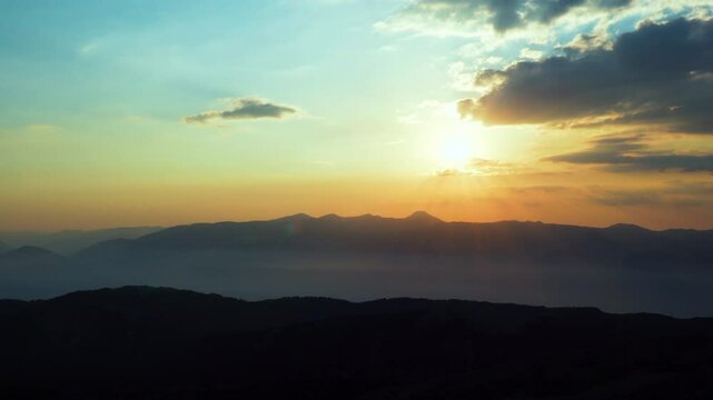 Time lapse of sunset in the mountains