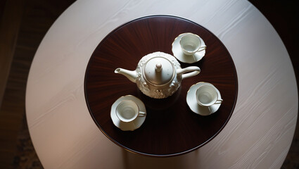 a set of tea cups and pots