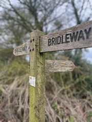 Wooden footpath signpost