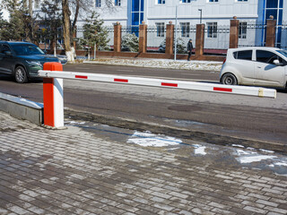 Barrier to control the passage of cars