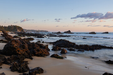 Rocky shore view of Narooma beach in the morning, NSW, Australia.