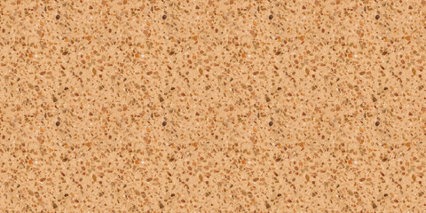A close-up, top-down view of a classic terrazzo floor, with small, multicolored stone chips embedded in a light beige base
