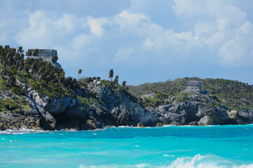 Mayan ruins overlook turquoise Caribbean waters in Tulum, Mexico.