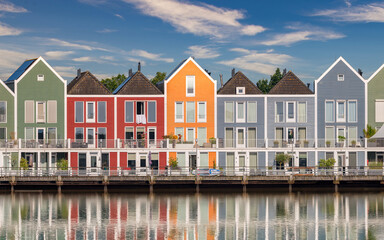 Reflection with houses on the lake in Houten Netherlands