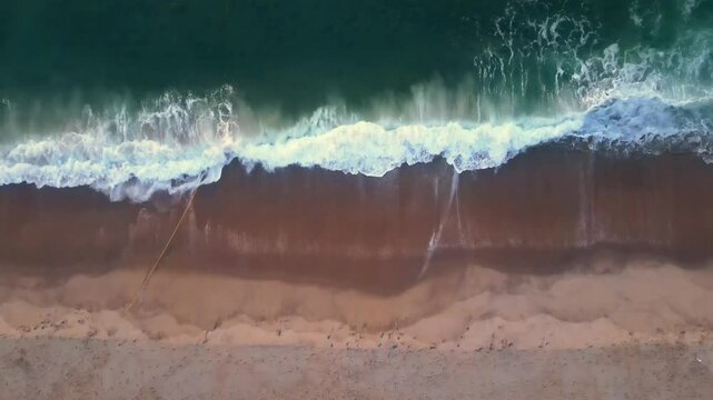Aerial view of beautiful sandy beach and tranquil ocean waves, Newport Beach, United States of America.