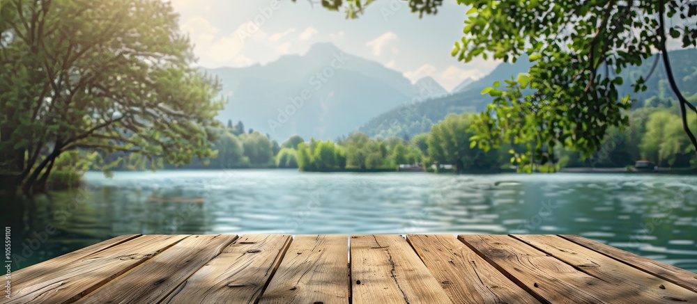 Poster wooden table with a blurred lake and park background offering a copy space image accentuated by the 