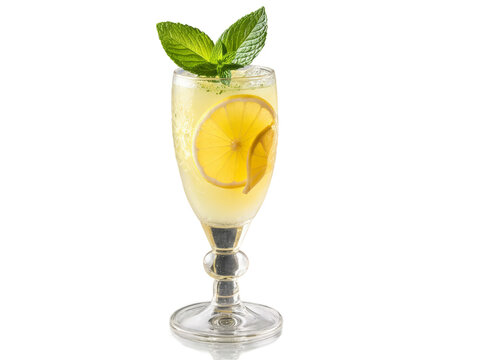 Sudanese Kisra in tall glass garnished with slice of lemon and sprig of mint