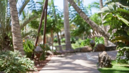 Blurred background evokes a serene tropical resort with defocused palm trees and foliage creating a tranquil atmosphere under bright sunlight and blue sky