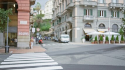 Blurry urban street scene in la spezia with defocused architecture and bokeh, featuring an indistinct man walking under a cloudy european sky.