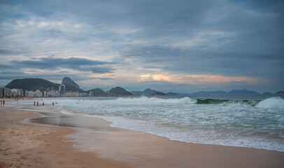 Sunset on Copacabana Beach in Rio de Janeiro.