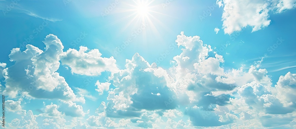 Wall mural sunny summer day with blue skies and fluffy white clouds creating an empty background with copy spac
