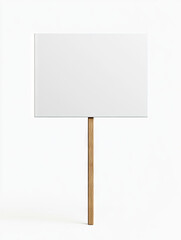 A blank white rectangular protest sign on a wooden stick