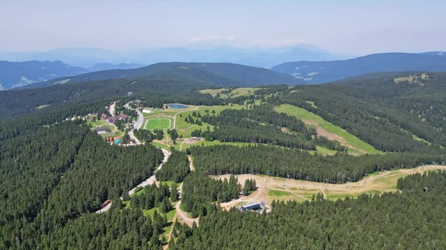 Aerial view of beautiful mountain landscape with serene forest and tranquil valley, Rogla, Slovenia.